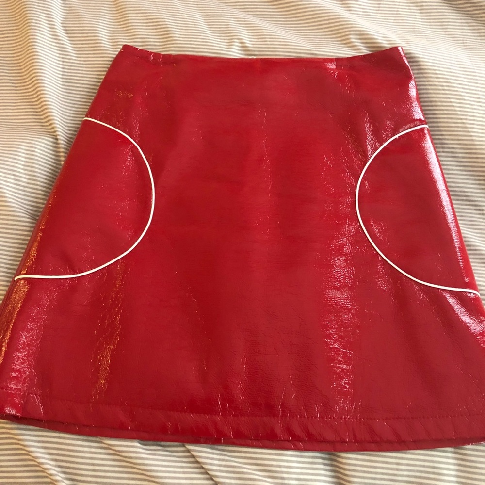 Red leather look mini skirt